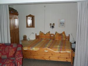 Een bed of bedden in een kamer bij fewoweis