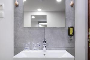 Koupelna v ubytování Garni Hotel Cirman