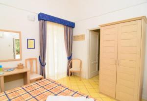 Postel nebo postele na pokoji v ubytování Villa Giusto