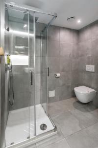 Koupelna v ubytování Garni Hotel Cirman