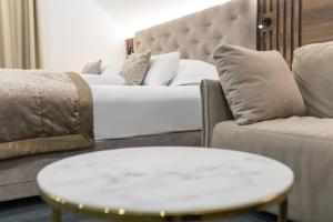 Posezení v ubytování Garni Hotel Cirman