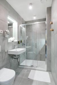 Koupelna v ubytování Garni Hotel Cirman
