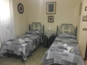 Ένα ή περισσότερα κρεβάτια σε δωμάτιο στο Bed and Breakfast Padalino
