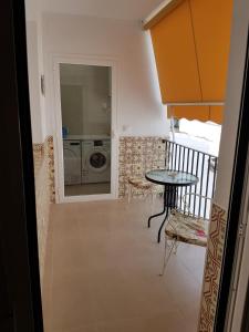 Kuchyňa alebo kuchynka v ubytovaní Apartamentos HELA