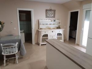 Posteľ alebo postele v izbe v ubytovaní Apartamentos HELA