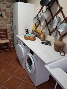 Kuchyňa alebo kuchynka v ubytovaní Apartamentos HELA