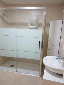 Kúpeľňa v ubytovaní Apartamentos HELA