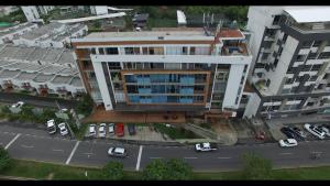 an overhead view of a large building with a parking lot at Metroloft 204 in Armenia