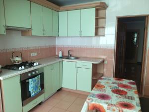 Kuchyň nebo kuchyňský kout v ubytování Apartments for rent