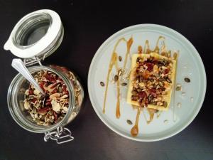 a plate with a piece of food and a cup of coffee at No 12 B&B in Dungarvan