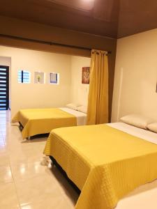 Ένα ή περισσότερα κρεβάτια σε δωμάτιο στο Apartamento Santa Isabel