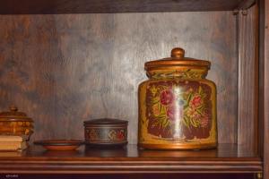 a glass jar sitting on a shelf with other items at CASA BLANCAFLOR in Peñaflor