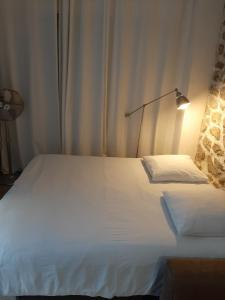 Cama o camas de una habitación en Villa des iris