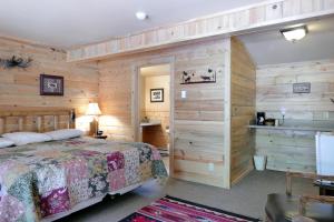 Ein Bett oder Betten in einem Zimmer der Unterkunft Bill Cody Ranch