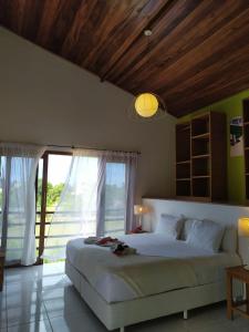 Refugios Parajuru - Casa Graf tesisinde bir odada yatak veya yataklar