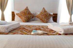 
Cama o camas de una habitación en Restead Stay Apartments
