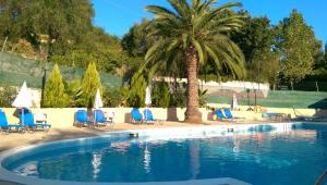 The swimming pool at or close to Tina Hotel