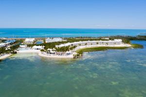 an aerial view of a resort in the water at Isla Bella Beach Resort & Spa - Florida Keys in Marathon