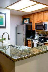 Kuchyň nebo kuchyňský kout v ubytování Desert Oasis Welk Resorts