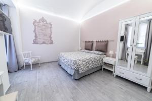 Postel nebo postele na pokoji v ubytování Re Vittorio