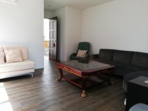 Posezení v ubytování Tata House B&B