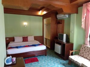 Postel nebo postele na pokoji v ubytování Blue Andaman Lanta Resort