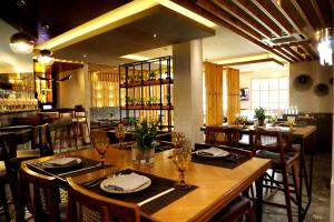 A restaurant or other place to eat at Ramada by Wyndham Jalandhar City Center