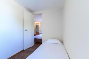 Postel nebo postele na pokoji v ubytování Comfort Hotel Amiens Nord