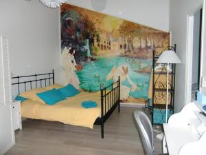 Postel nebo postele na pokoji v ubytování La Villa des Violettes + 67 fotografií