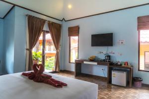 Ein Bett oder Betten in einem Zimmer der Unterkunft Chomview Resort