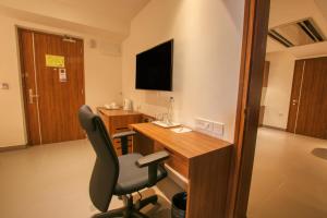 TV o dispositivi per l'intrattenimento presso Lilac Hotel, 5th Block