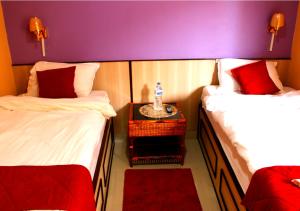 Postel nebo postele na pokoji v ubytování Hotel Tranquil