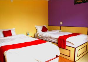 Postel nebo postele na pokoji v ubytování Hotel Tranquil