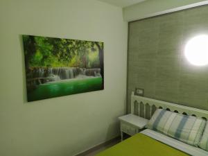 Cama o camas de una habitación en Apartamento primera línea de mar