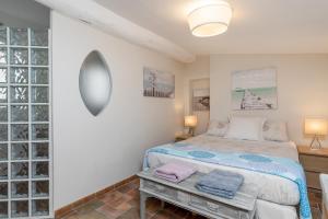 a bedroom with a bed in a room at My rima in Antibes