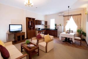 TV a/nebo společenská místnost v ubytování Palace Hotel Vung Tau