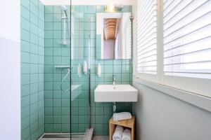 Ванна кімната в Hotel La Grande Cloche