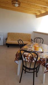 Posezení v ubytování Bilocale vista spiaggia 10 metri dal mare