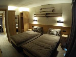A bed or beds in a room at CHALET REMI - DOMIN