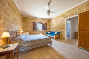 Postel nebo postele na pokoji v ubytování torre casciani + 37 fotografií
