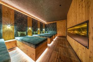 Rúm í herbergi á Hotel Comploj Adults only
