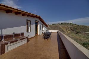 Balkón alebo terasa v ubytovaní Casa Vacanza Villa Anna + 15 fotografií
