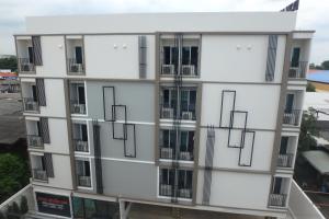 an external view of a building with balconies at Donmueang Place Hotel - SHA Plus in Bangkok