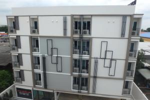 an external view of a building with balconies at Don Mueang Place Hotel in Bangkok