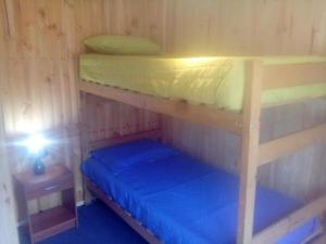 Postel nebo postele na pokoji v ubytování Cabaña Horcon