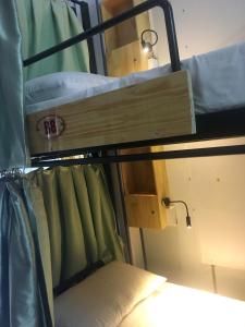 Postel nebo postele na pokoji v ubytování Hoa Luan Hostel