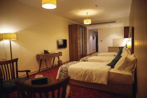 Yaldiz Palace Hotel客房内的一张或多张床位