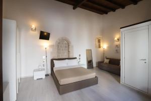 Postel nebo postele na pokoji v ubytování Italiana Resort Atrio + 37 fotografií