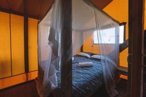 Postel nebo postele na pokoji v ubytování Szálka Glamping