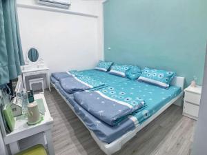 Postel nebo postele na pokoji v ubytování Lovi Time B&B